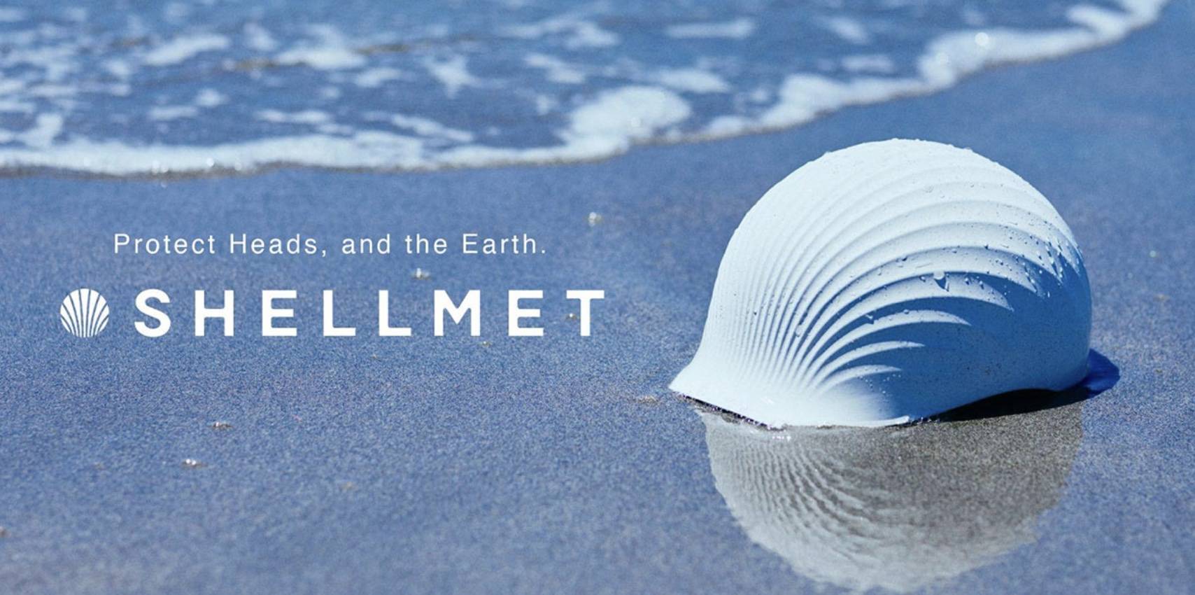 Image of a shell in the form of a helmet on the beach with waves in the background. To the left of the helmet in white copy reads "Protect Heads, and the Earth. Shellmet"