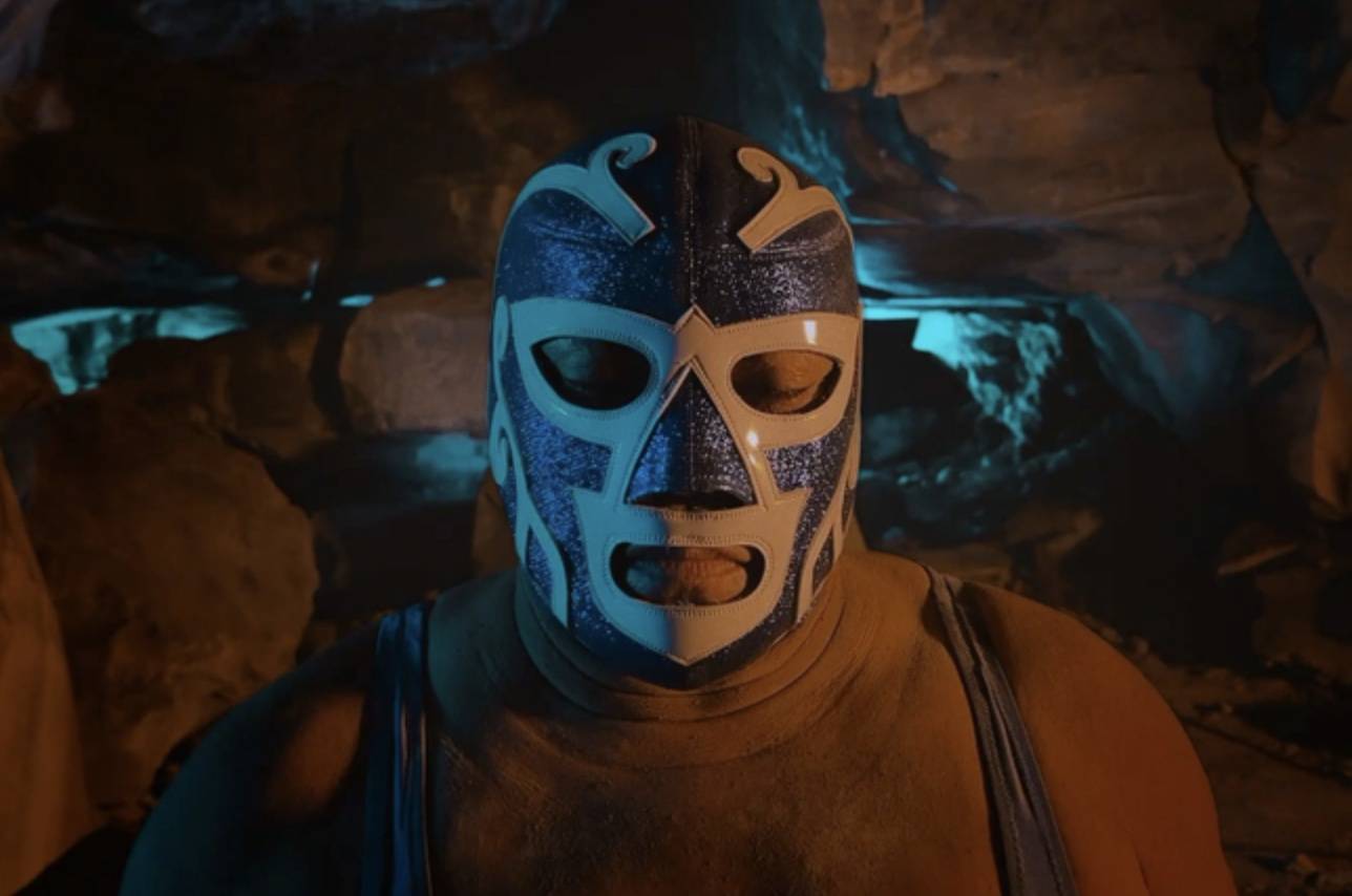 Photo of man wearing a lucha libre mask