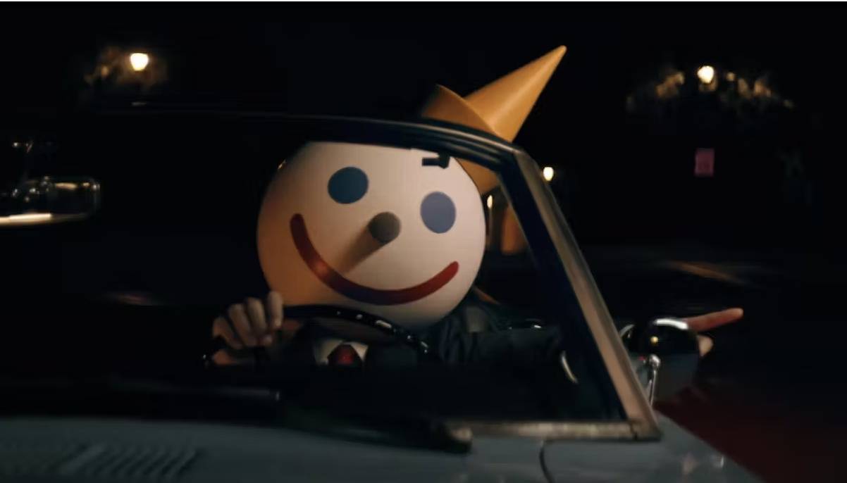 Jack in the Box mascot driving car