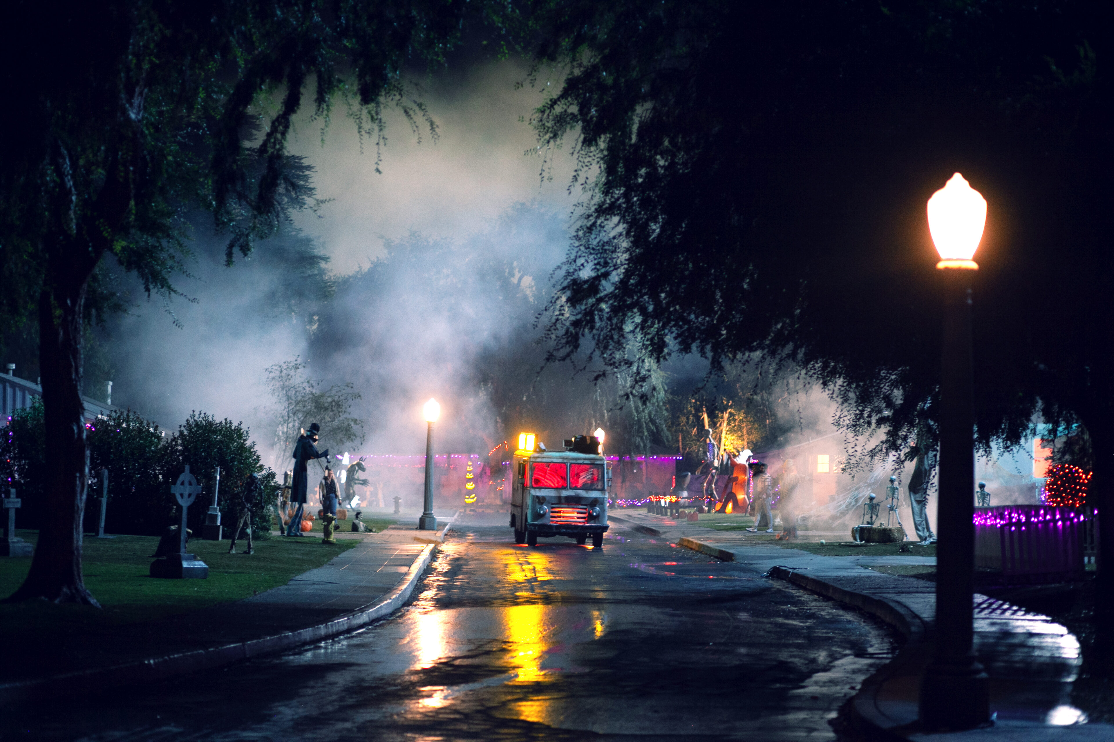 A haunted food truck emerges from the mist in a dark night, for Jack in the Box's horror film