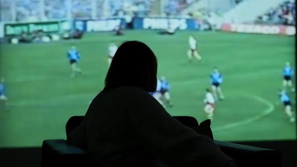 A woman stares onto a football field for The Replay for The Alzheimer Society of Ireland by TBWA\Dublin